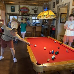 two men playing pool