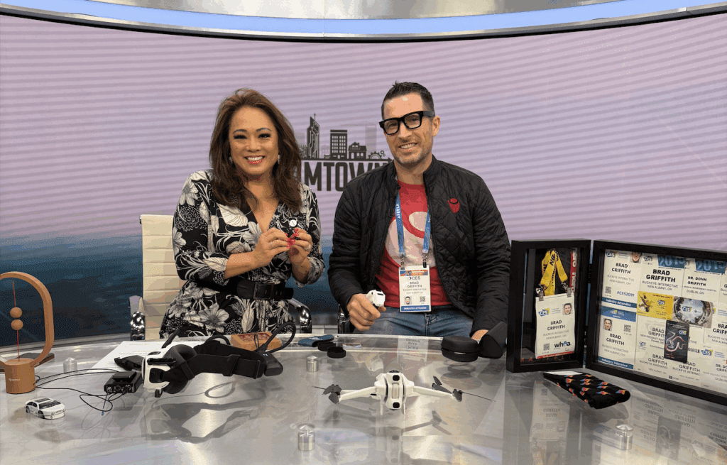 Brad and Angela An at anchor desk